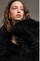 Women's black sheepskin coat made of natural llama